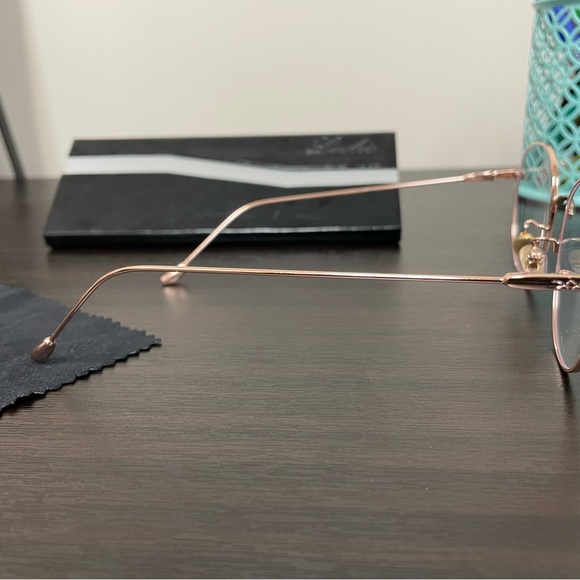 Blue light blocking glasses.  No prescription - Picture 2 of 5